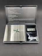 Vintage Emerald Cross Pendant with Natural Diamond Center in Solid 9ct Gold