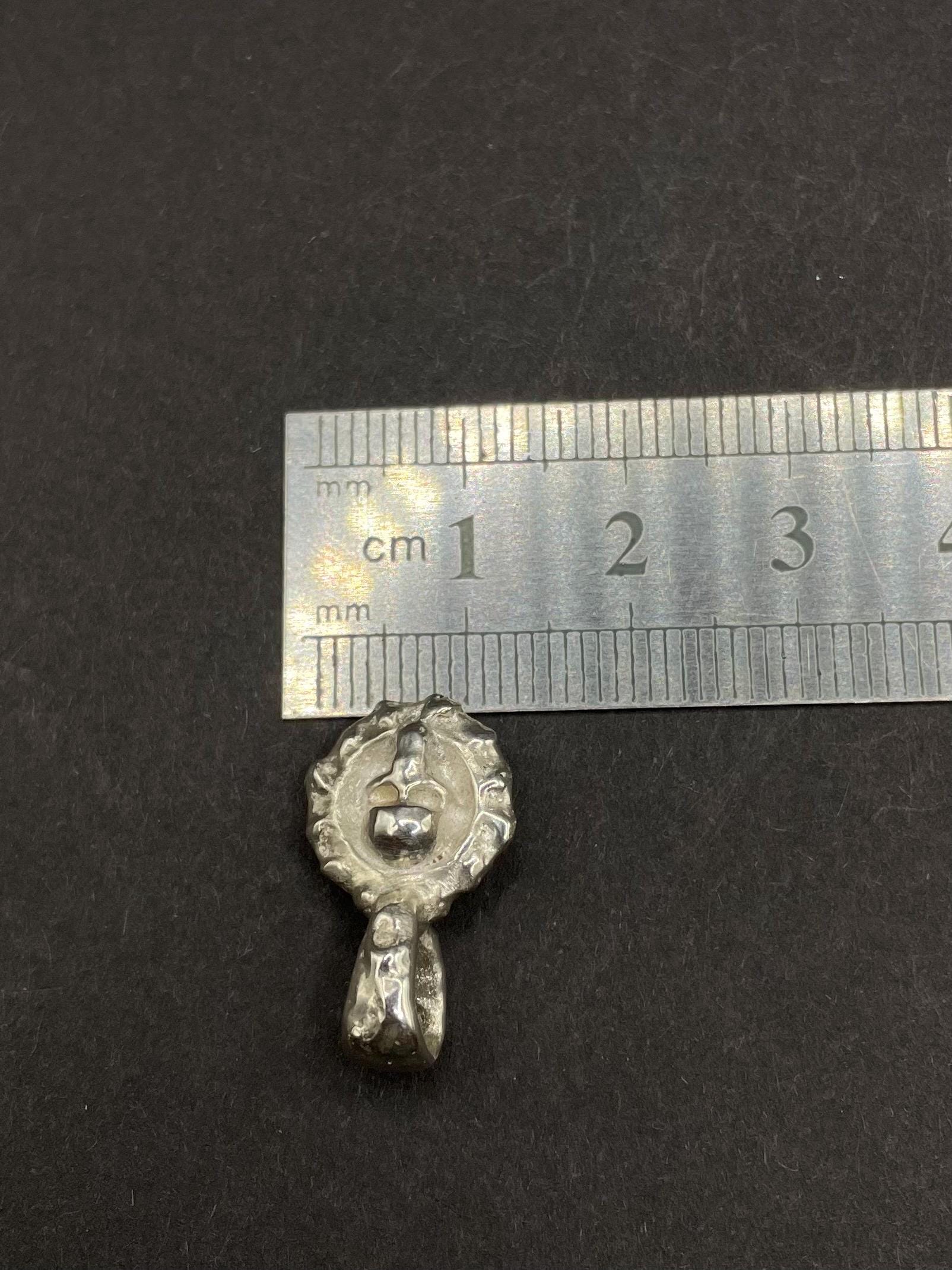 Skull pendant in solid silver 999